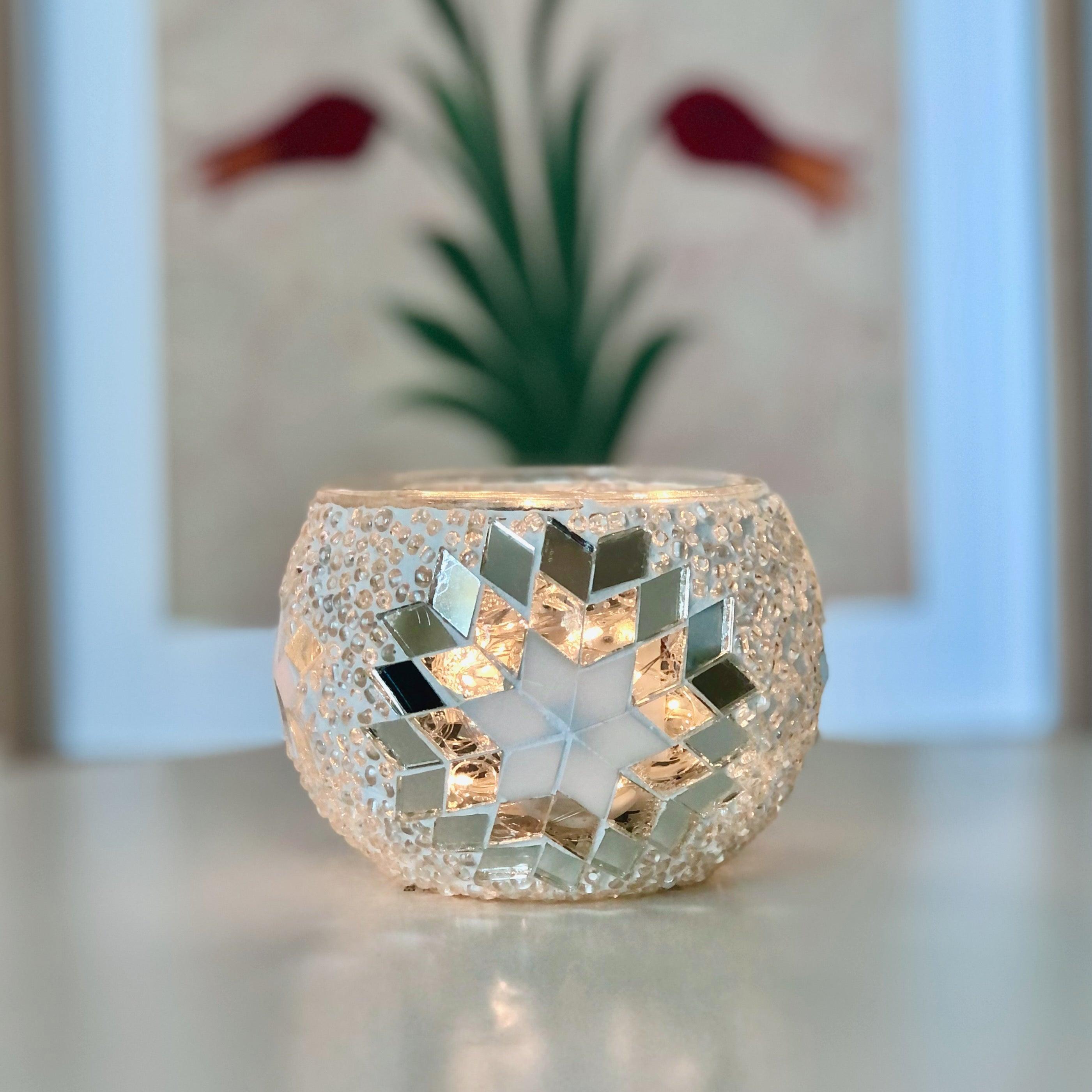 Silver Turkish mosaic candle holder with star pattern on table, indoor decor lighting