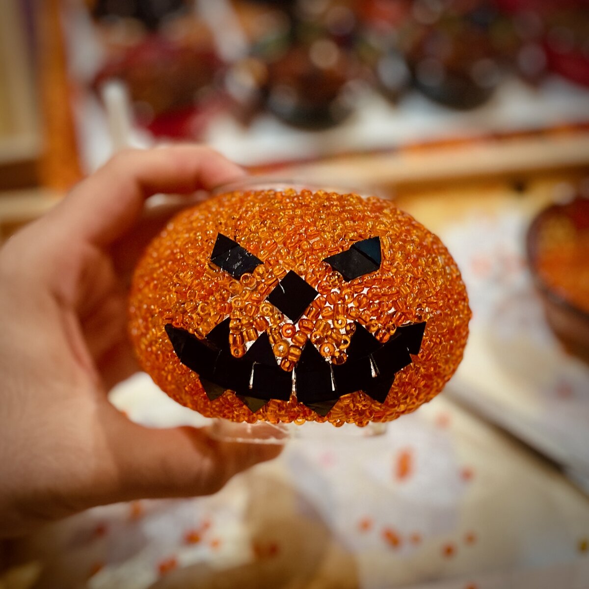 Finished Halloween mosaic pumpkin lamp with a black-glass jack-o'-lantern face