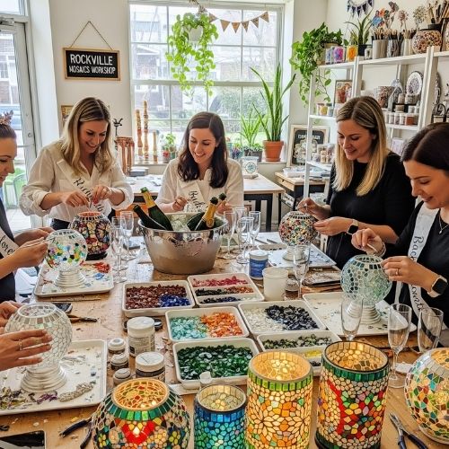 Women creating colorful mosaic lamps at Rockville Mosaics Workshop during a bachelorette party