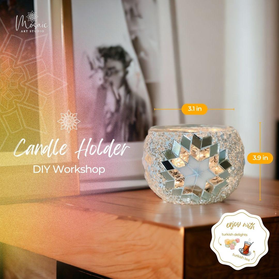 Decorative glass candle holder with mosaic star pattern on wooden table in cozy interior