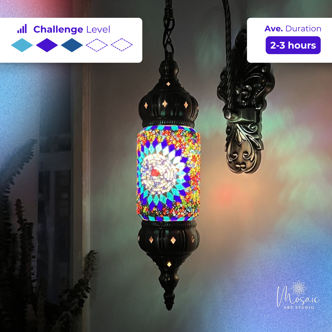 Experience the Magical Mixture of Blue and Purple in a Cylinder Mosaic Wall Sconce