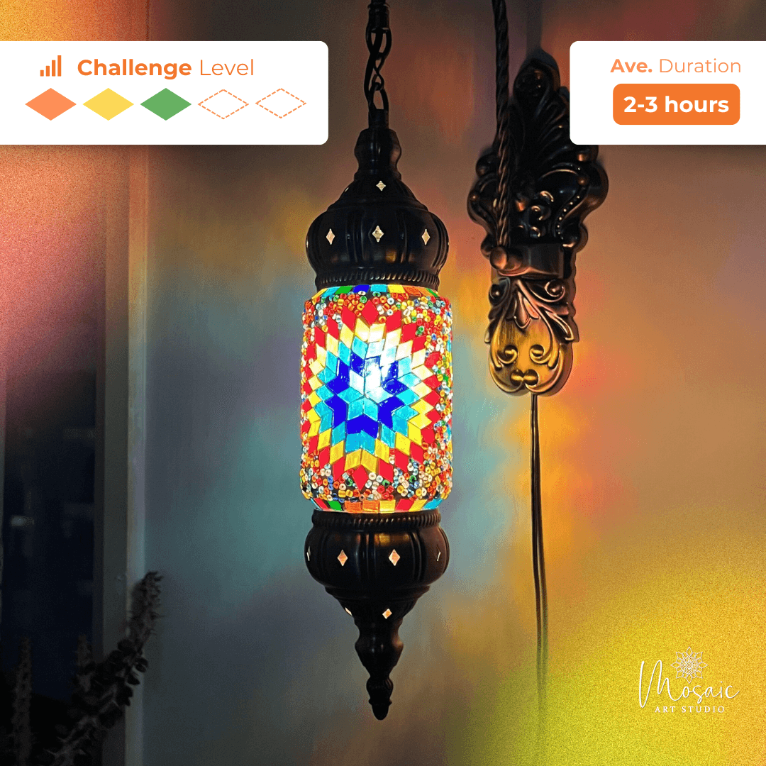 Colorful mosaic lamp with geometric star pattern hanging on ornate dark metal wall bracket