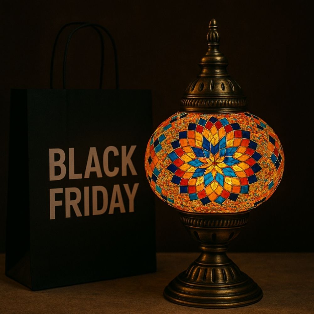 Colorful mosaic table lamp next to a black shopping bag with Black Friday text