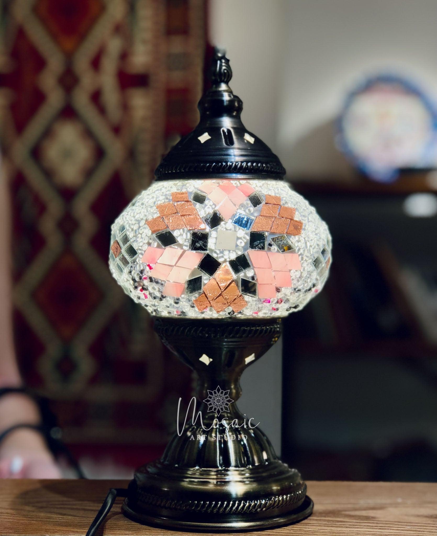 Turkish mosaic lamp with pink snowflake design on black metal base, traditional decor
