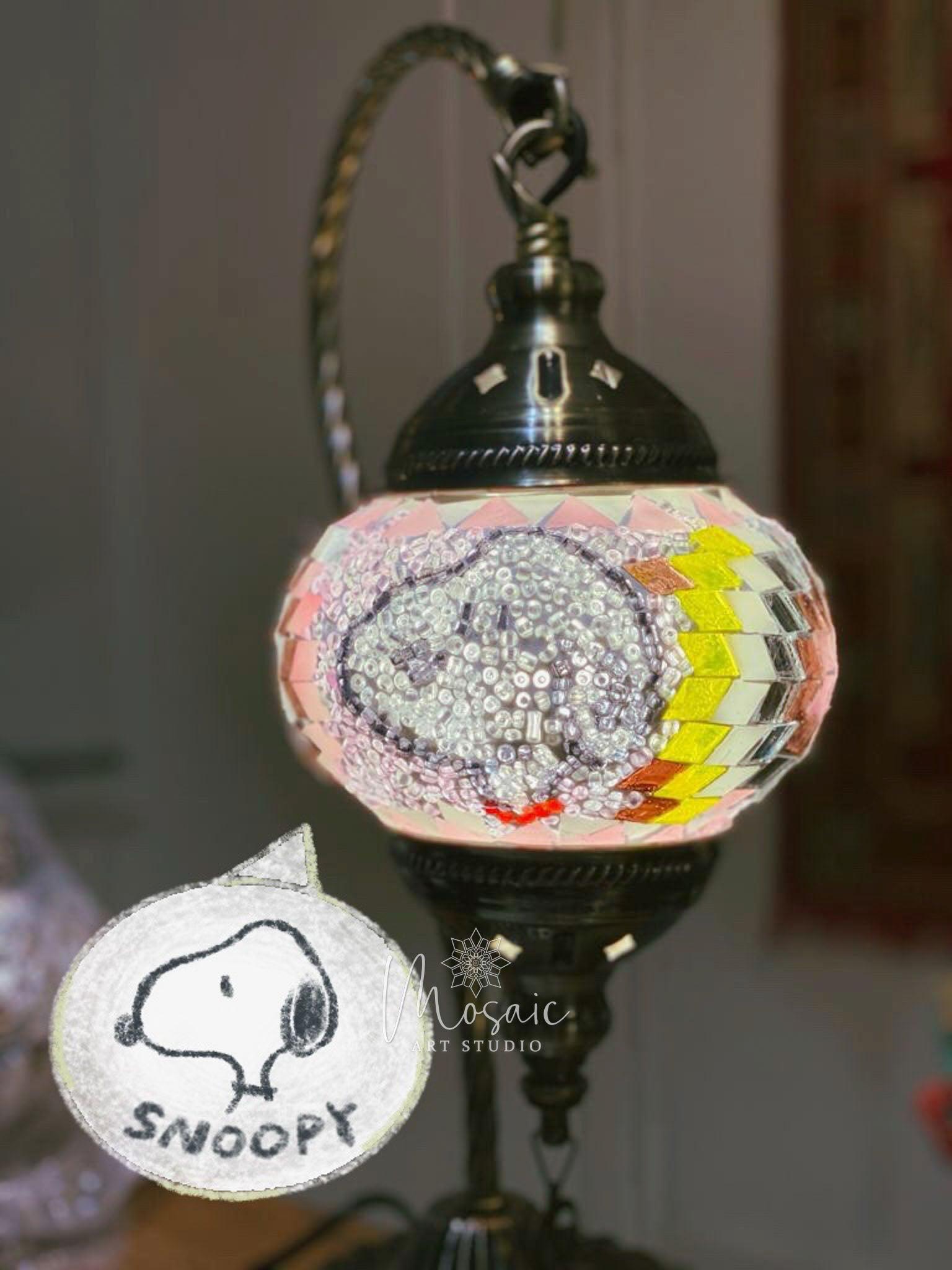 Turkish mosaic lamp featuring a beaded cartoon Snoopy character in pink, yellow, and white hues