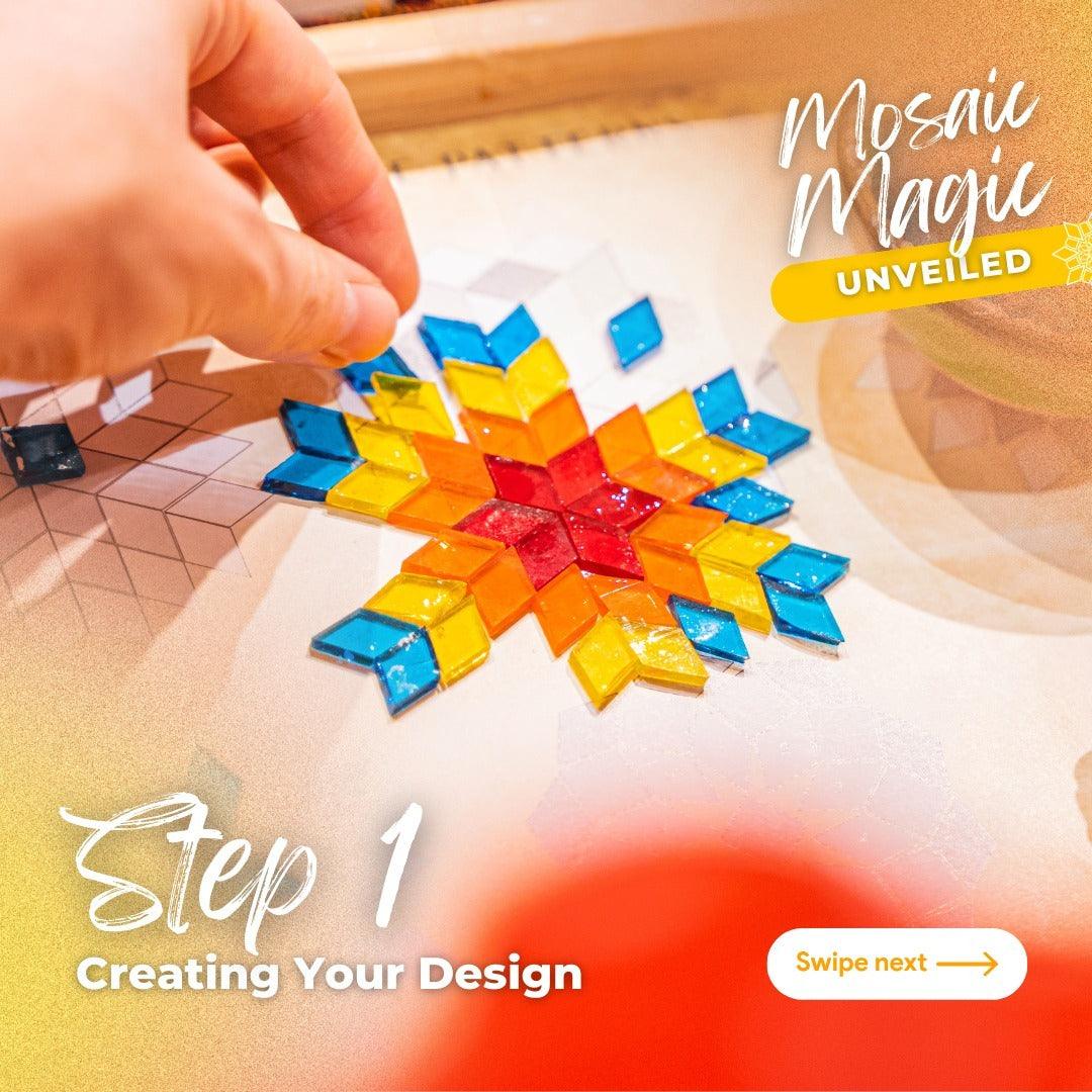 Hand placing colorful glass tiles on a star-shaped mosaic design on a gridded canvas