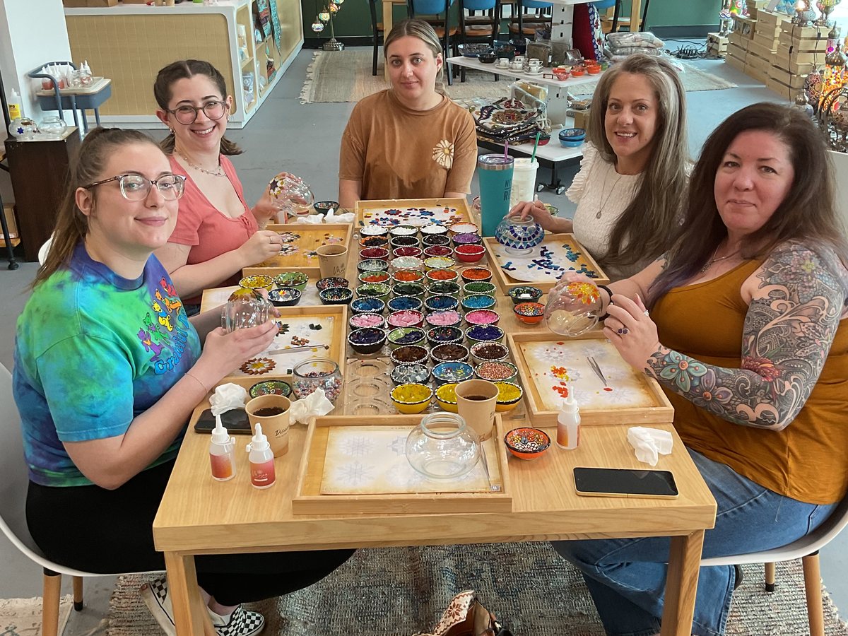 Guests making Turkish mosaic lamps at a workshop in Voorhees, NJ