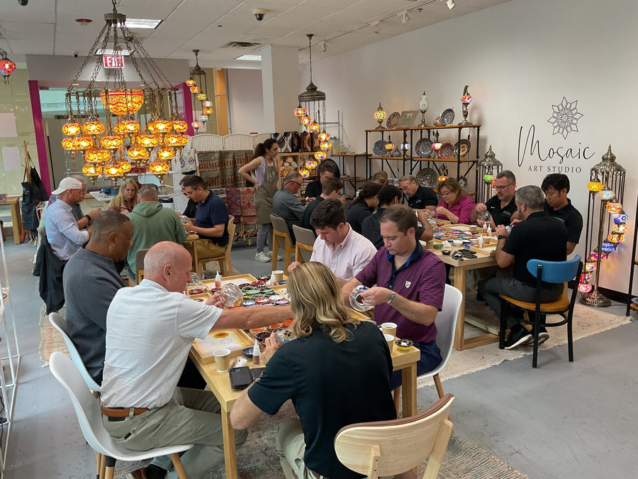 A company team at a private mosaic lamp workshop in Voorhees, NJ