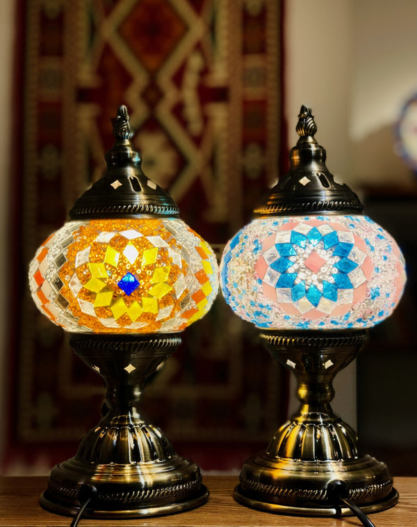 Amber sunburst and a sky-blue star. Handmade with love at a Mosaic Art Studio workshop.