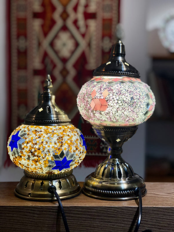 Amber with cobalt stars, beside blush pink. Handmade with love at a Mosaic Art Studio workshop.