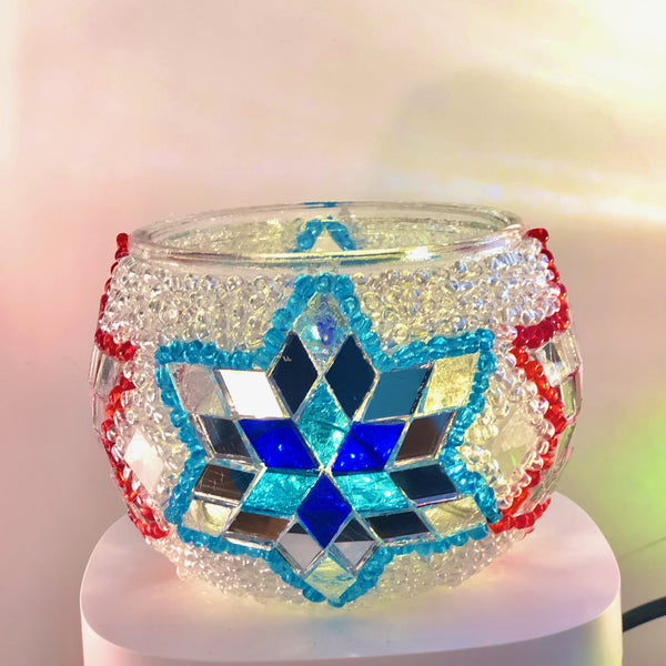 Blue star with a red bead trim. Handmade with love at a Mosaic Art Studio workshop.