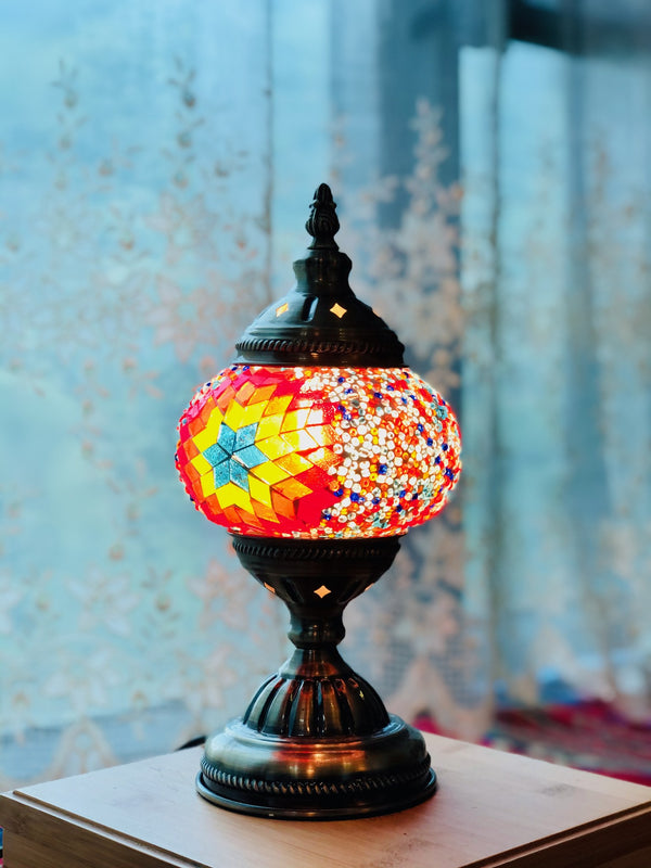 Fiery sunburst in red and gold. Handmade with love at a Mosaic Art Studio workshop.
