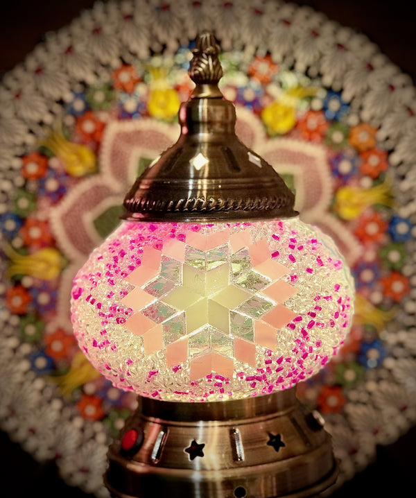 Hot pink and silver starburst. Handmade with love at a Mosaic Art Studio workshop.