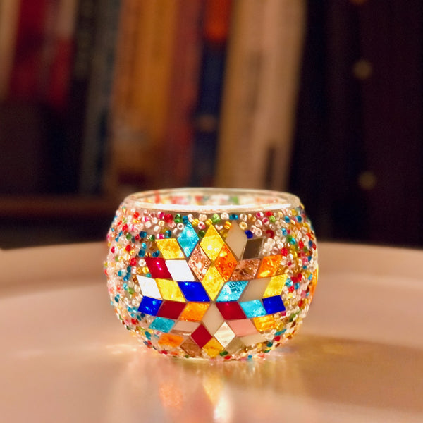 Jewel-tone star on clear glass. Handmade with love at a Mosaic Art Studio workshop.