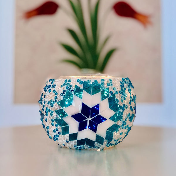 Navy star on speckled teal. Handmade with love at a Mosaic Art Studio workshop.