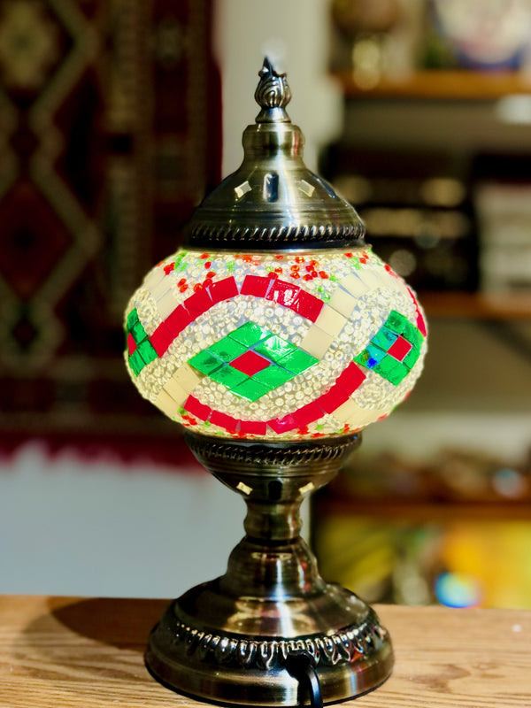 Red and green ribbons on white. Handmade with love at a Mosaic Art Studio workshop.