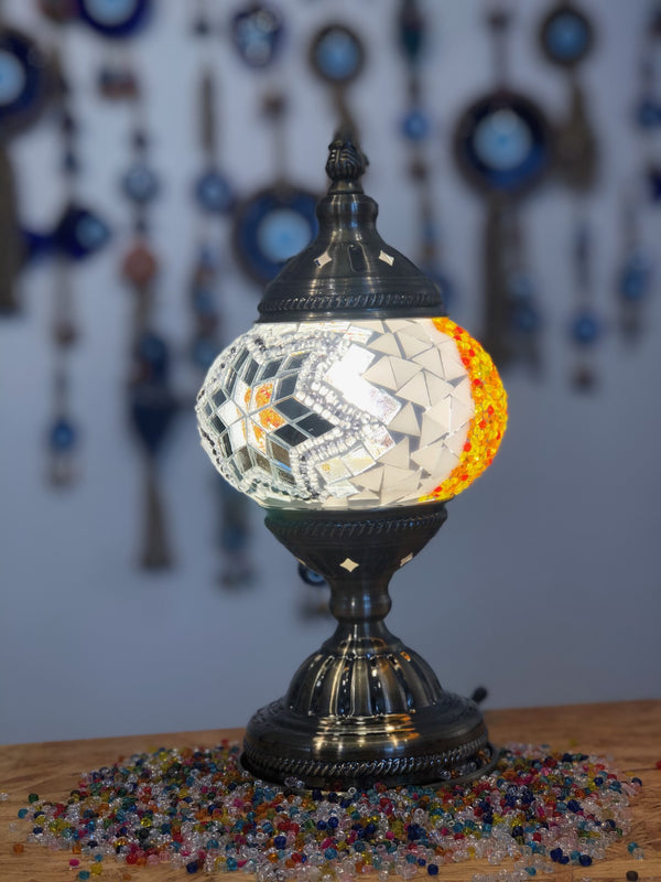 Silver star with an orange crescent. Handmade with love at a Mosaic Art Studio workshop.