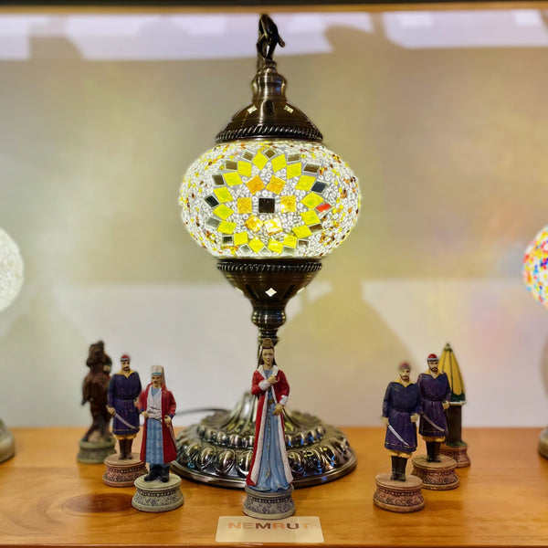 Sunflower yellow with a jet centre. Handmade with love at a Mosaic Art Studio workshop.