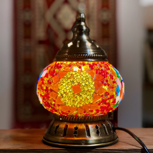Sunset orange with a golden ring. Handmade with love at a Mosaic Art Studio workshop.
