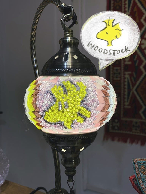 Woodstock in lemon yellow on blush pink. Handmade with love at a Mosaic Art Studio workshop.