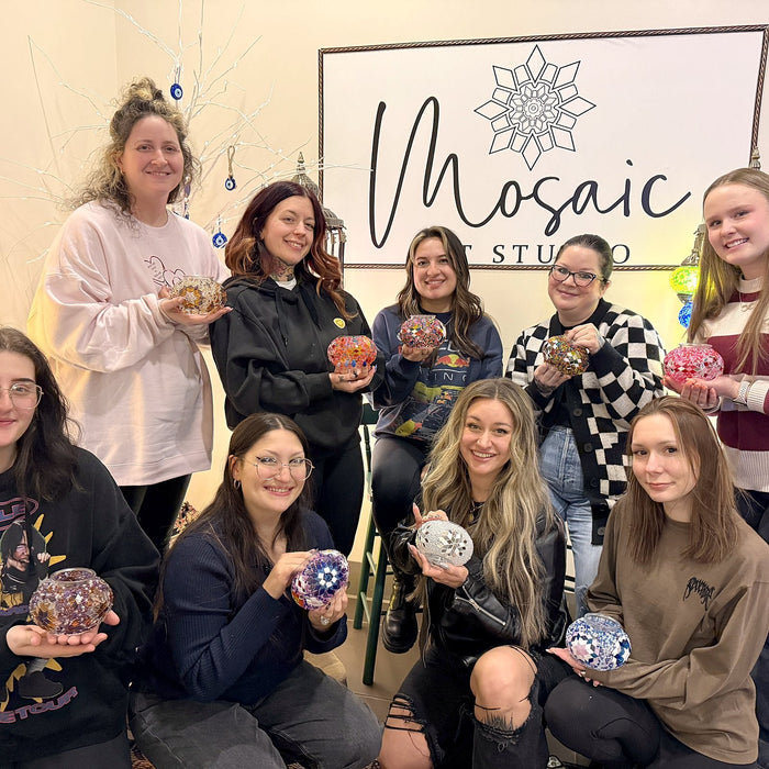Group of friends on a girls night out with their mosaic lamps