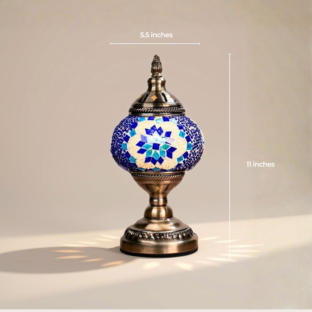 Turkish mosaic table lamp with a blue star pattern on an antique bronze pedestal, 5.5 by 11 inches